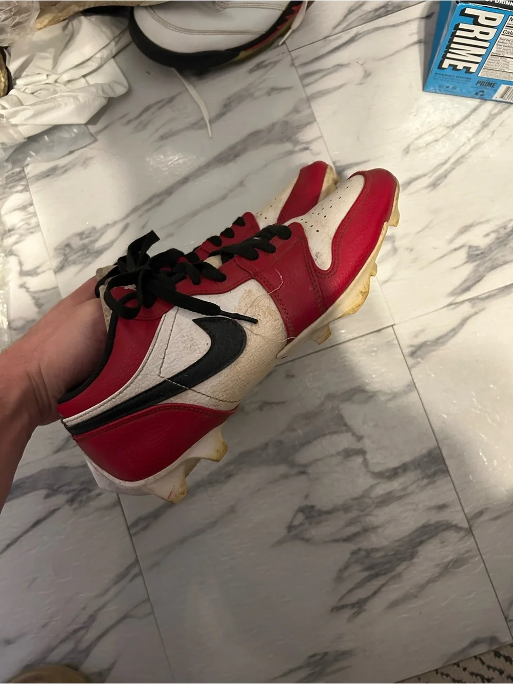 Jordan 1 low cleats.